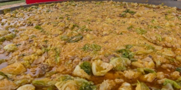 L’Aldea serveix més de 550 racions en una 17a Diada de l’Arròs amb Col i Pèsols marcada per la germanor